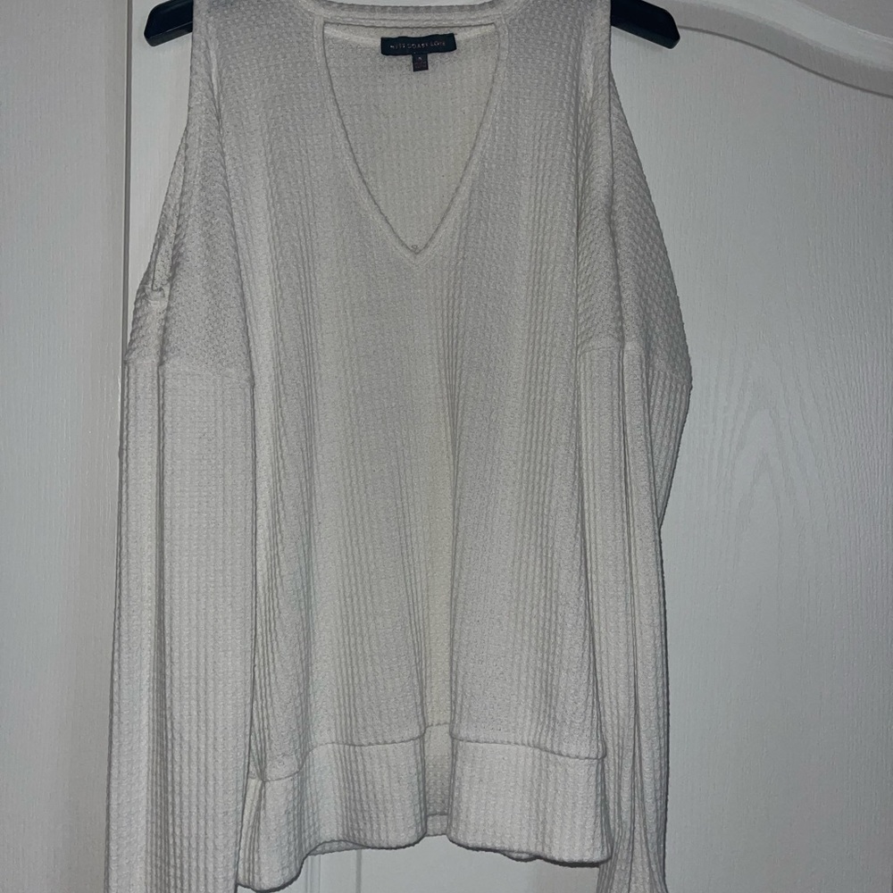 A white sweater, size small